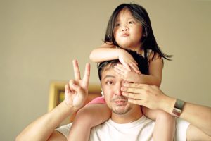 Family members having a peace of mind with insurance.